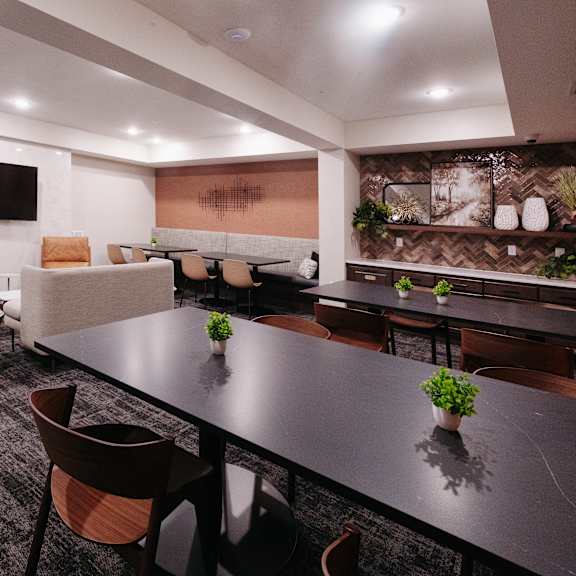 a conference room with a large table and chairs