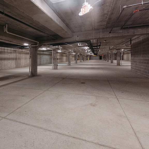 the inside of a parking garage in a building
