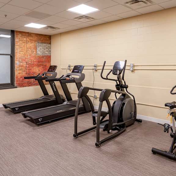 our gym has a lot of exercise equipment for residents to use