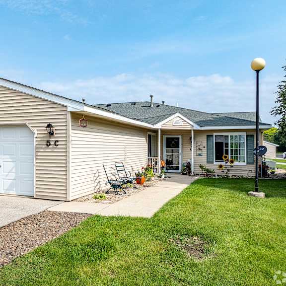 a house with a garage and a driveway.