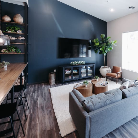 a living room with a couch and a tv