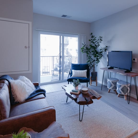 a living room with a couch and a tv