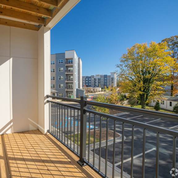 Thumbnail 8 of 9 Large Balcony at The Delaney at East Park Apartments, Kennesaw, 30144  Floor Plan  No   26673626  p1947634  The Delaney at East Park  shoootin-photo-16(8).jpg    A gym with a variety of equipment incl