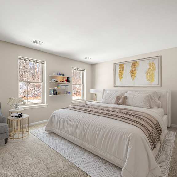a bedroom with a bed, chair, and window.