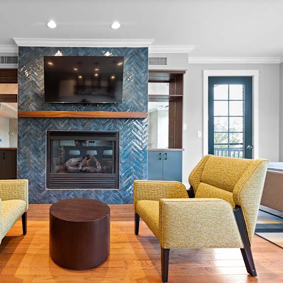 stylish clubhouse at claremont apartments in exton, pa, offering a comfortable space for residents to gather