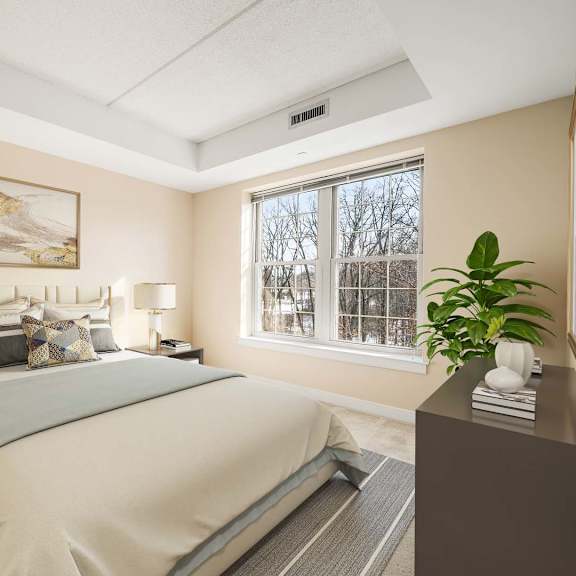 a bedroom with a large bed and a painting on the wall.