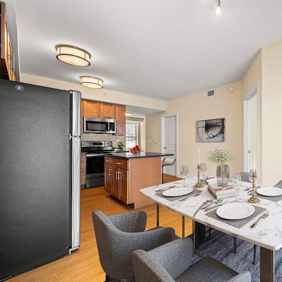 a dining room with a table set for two.