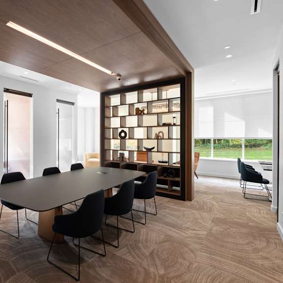 co-working space featuring a conference table and an elaborate bookshelf at hamilton at eagleview, exton, pa