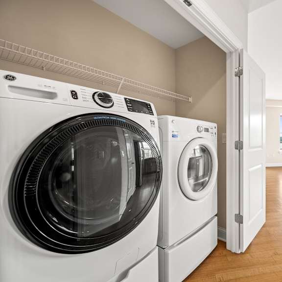 a laundry room with a washer and dryer.