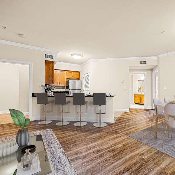 contemporary kitchen with a dining table set up, creating a stylish and functional space at claremont apartments in exton, pa