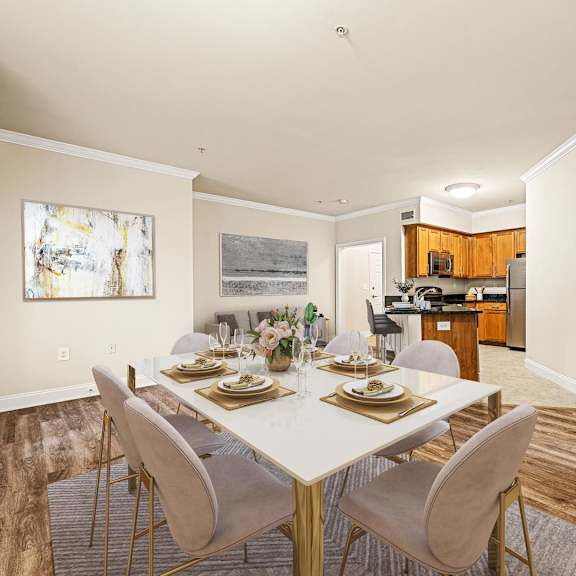 dining room with a table set for a meal, featuring a bright and inviting atmosphere at claremont apartments in exton, pa