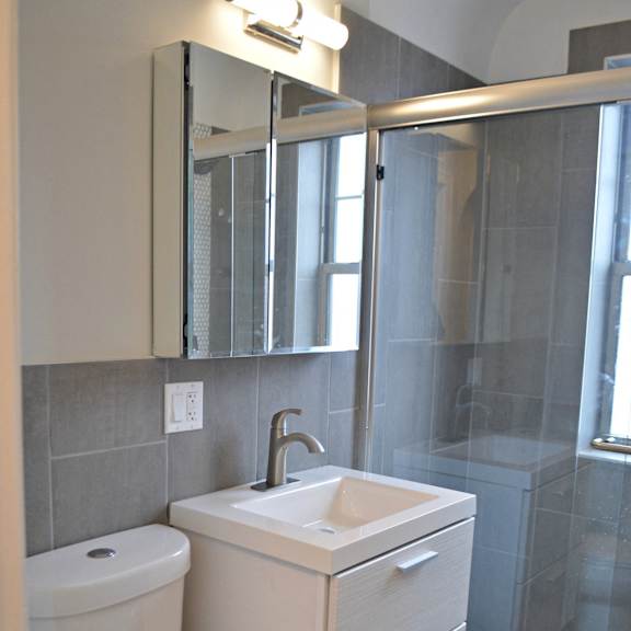a small bathroom with a toilet and a sink