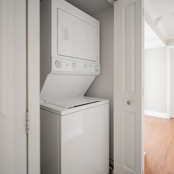 a white oven and dishwasher in a kitchen.