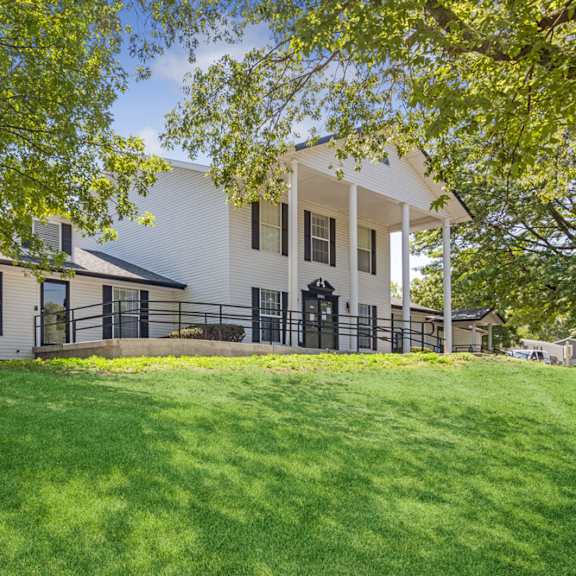clubhouse exterior at southfork mhc in belton, mo