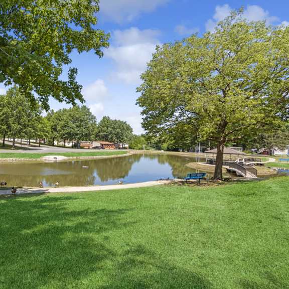 private lake and greenscape at southfork mhc in belton, mo
