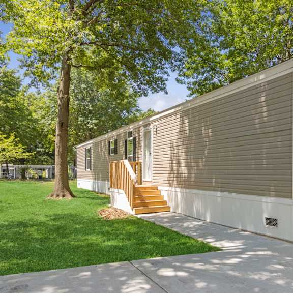 model home exterior at southfork mhc in belton, mo