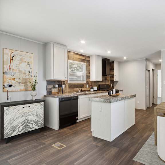 model kitchen and dining area at southfork mhc in belton, mo