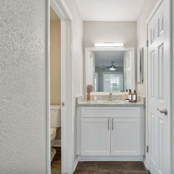 a view of a bathroom with a white door