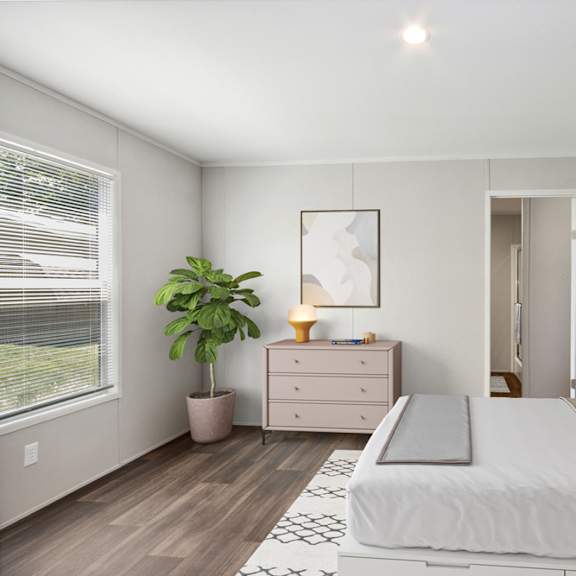 model bedroom at southfork mhc in belton, mo