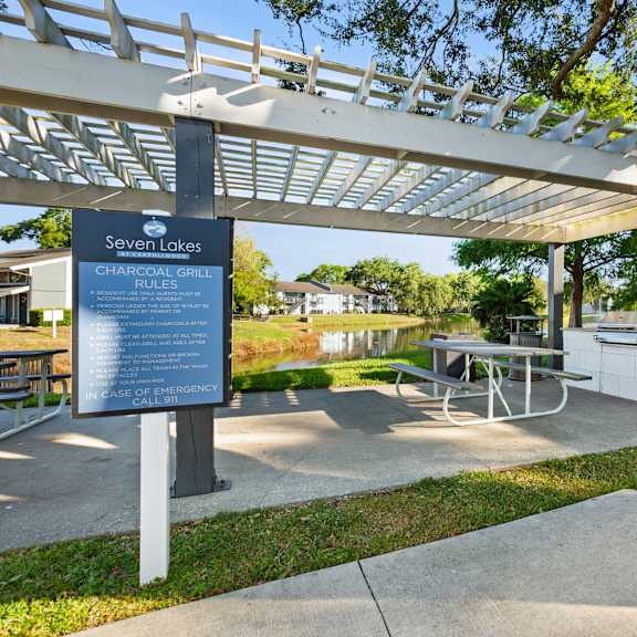 community pergola and seating area at seven lakes at carrollwood in tampa, florida.