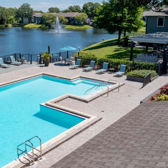 swimming pool next to the lake