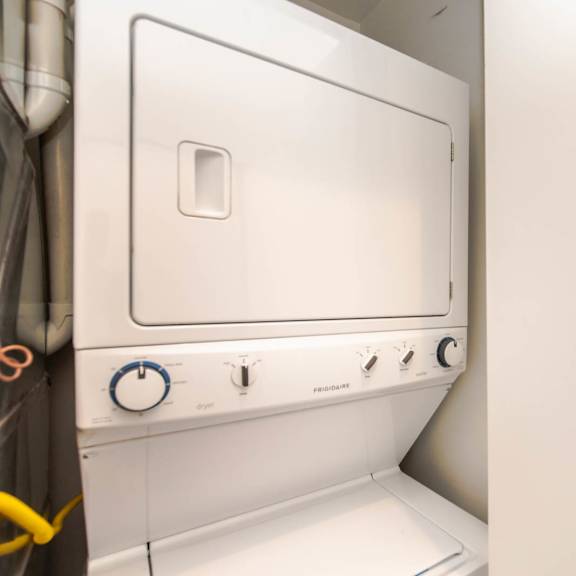 a white washer and dryer in a laundry room