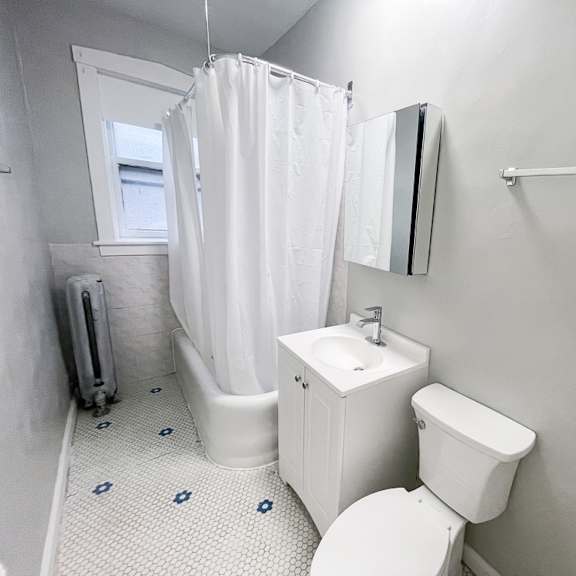 a small bathroom with a toilet and a sink