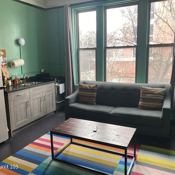 a living room with a couch and a coffee table