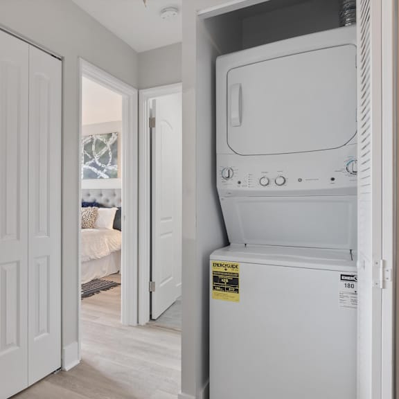 a washer and dryer in a 555 waverly unit