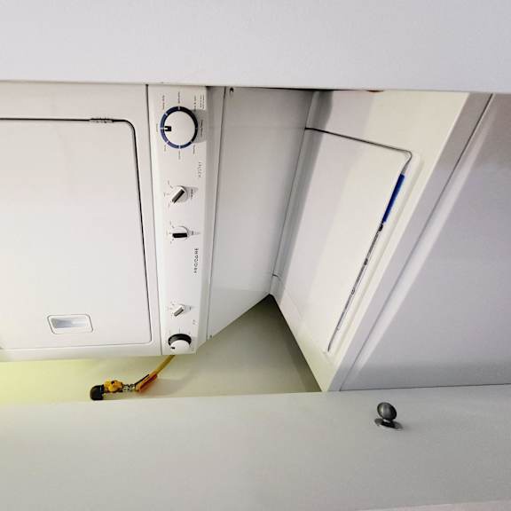 an overhead view of a microwave oven in a kitchen