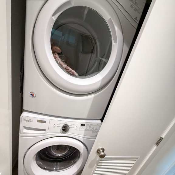 a person is standing inside a washing machine.