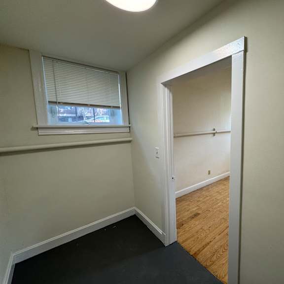 a room with a doorway leading to another room.