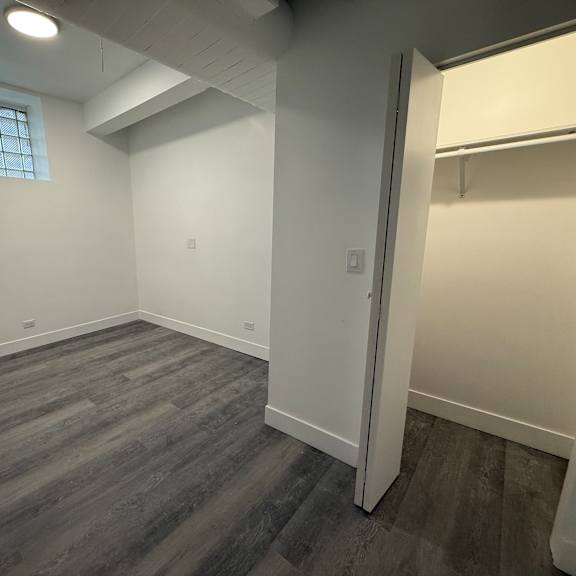a room with a window and a door.