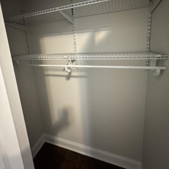 empty white shelves in a room.