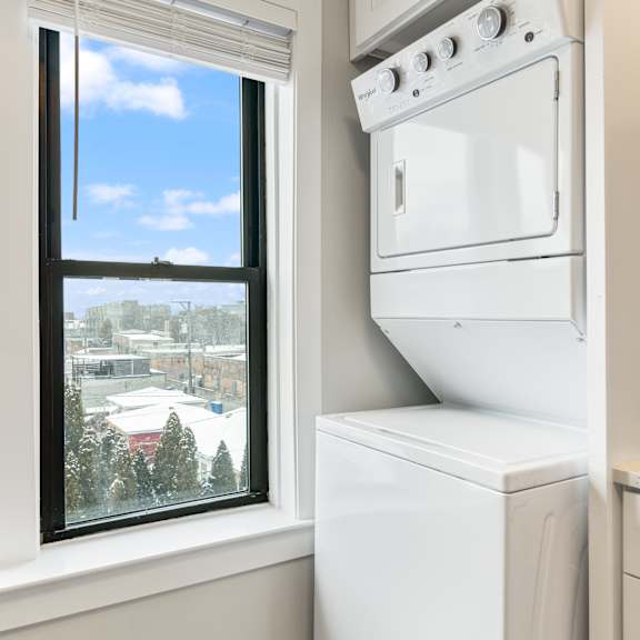 a white oven and dishwasher in a kitchen.