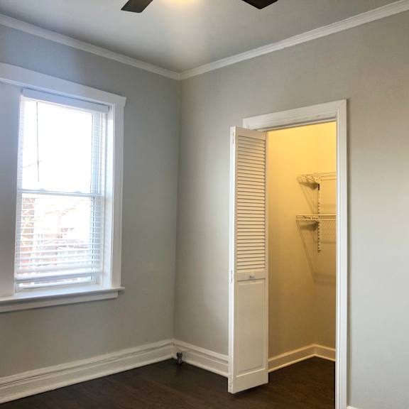 a room with a window and a door.
