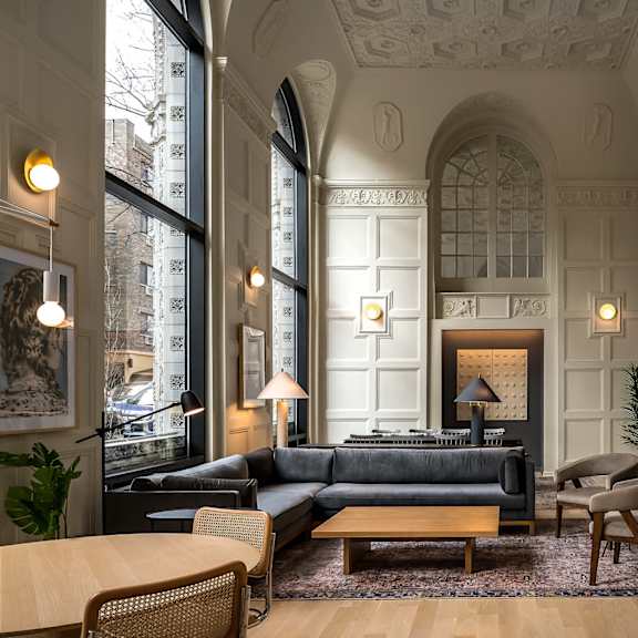 a living room with a couch and a fireplace