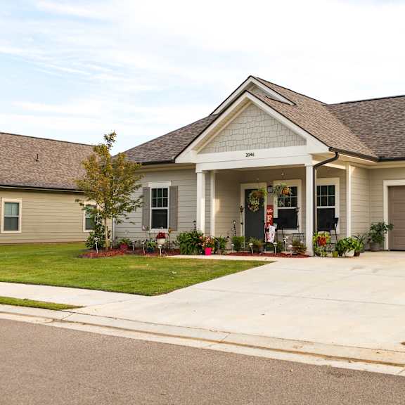 a house with a driveway and a garage door