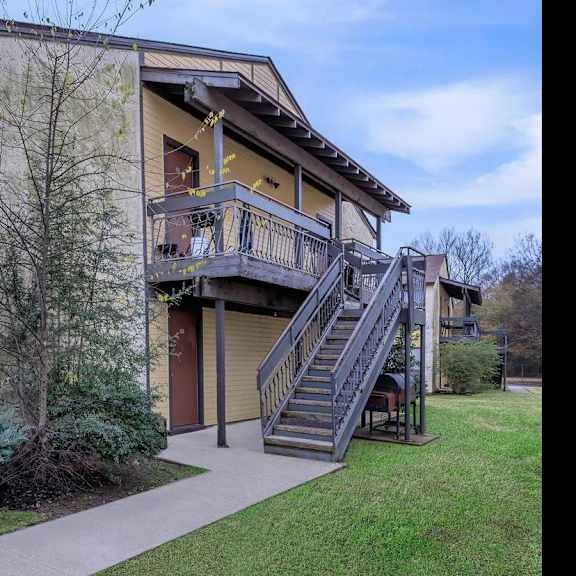 a building with a staircase leading to the second floor.