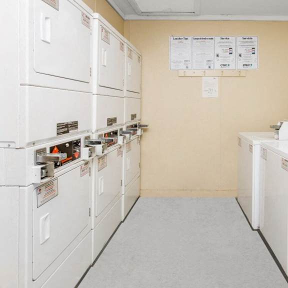 a row of white appliances in a room