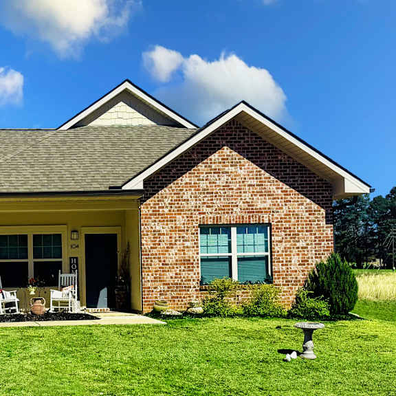 a house with a garage and a driveway.