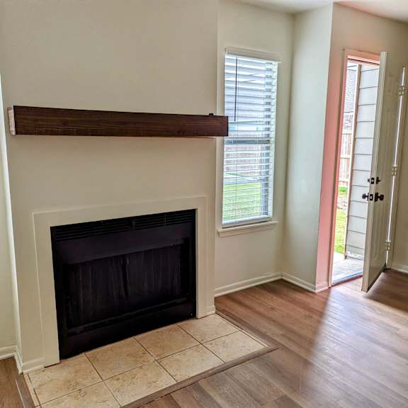 living room with a fireplace at shenandoah bend apartments, baton rouge, louisiana