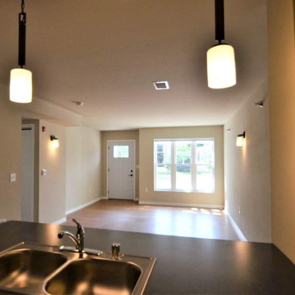 the canterbury | 1 br | living area | three sixty real estate