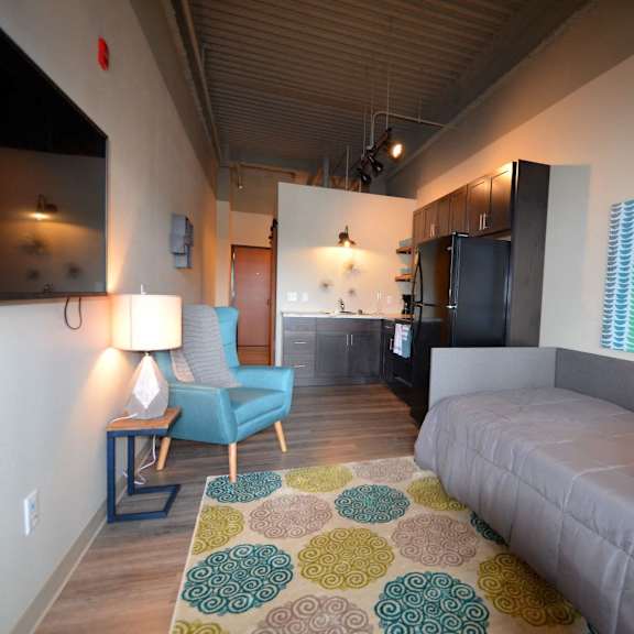 hub | studio | efficiency | living area | three sixty real estate