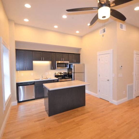 apartment 202 | 1 br | living area | kitchen | dining area |  three sixty real estate