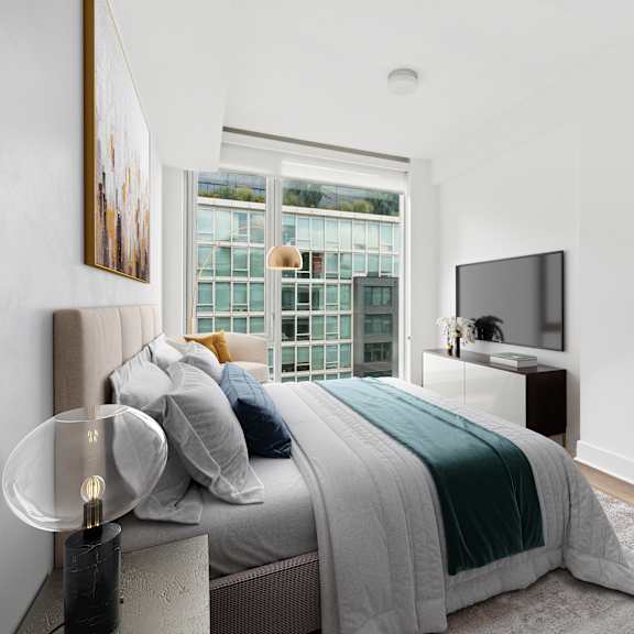 Thumbnail 3 of 5 A modern bedroom with a large bed and a flat screen TV.