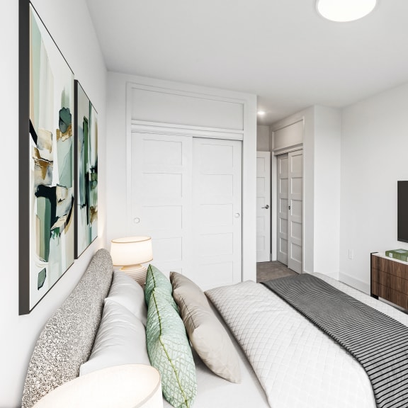 Thumbnail 6 of 7 a bedroom with a large bed and a tv