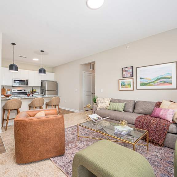 a living room with a couch and a table
