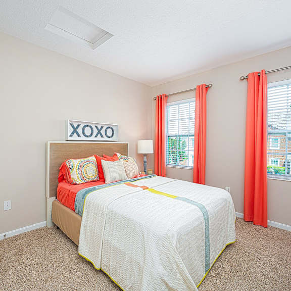 a spiral bed in a room with a circle of windows