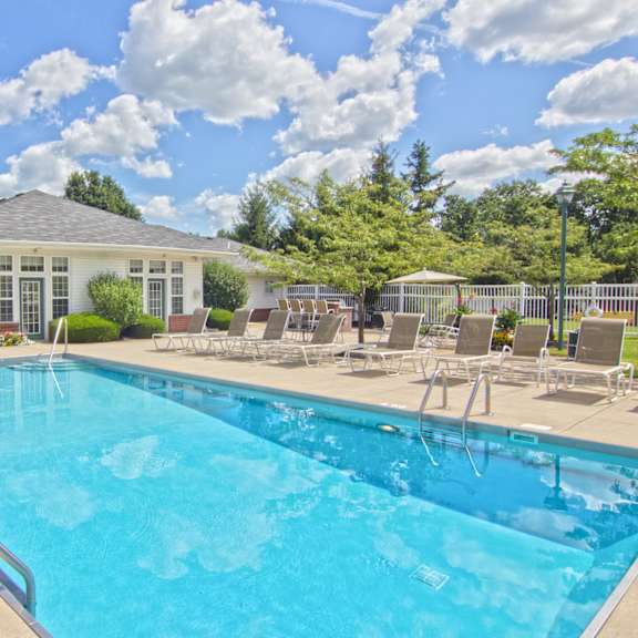 our apartments have a resort style pool with chairs